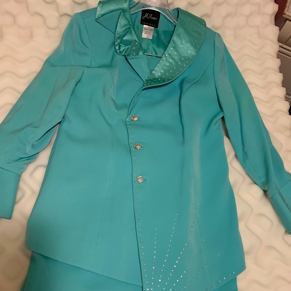 Milano 2 pc skirt set with stand up collar with beaded accents, cuffed sleeves.